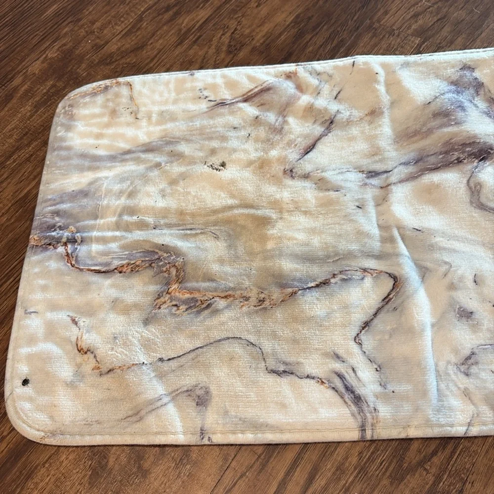 White marble bathroom mat